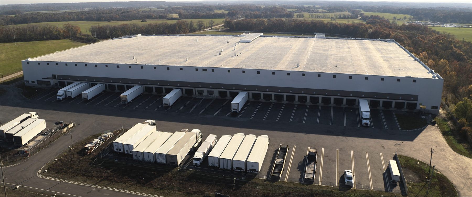 Aerial view of the PennAtlas.ai distribution campus with loading docks and trailer yard